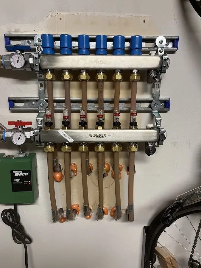 Plumber performing Water Heater Repair at a residential property in Atwater